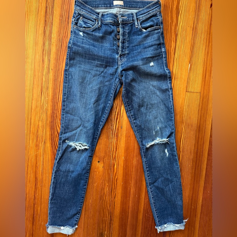 Distressed, high rise button fly MOTHER jeans.